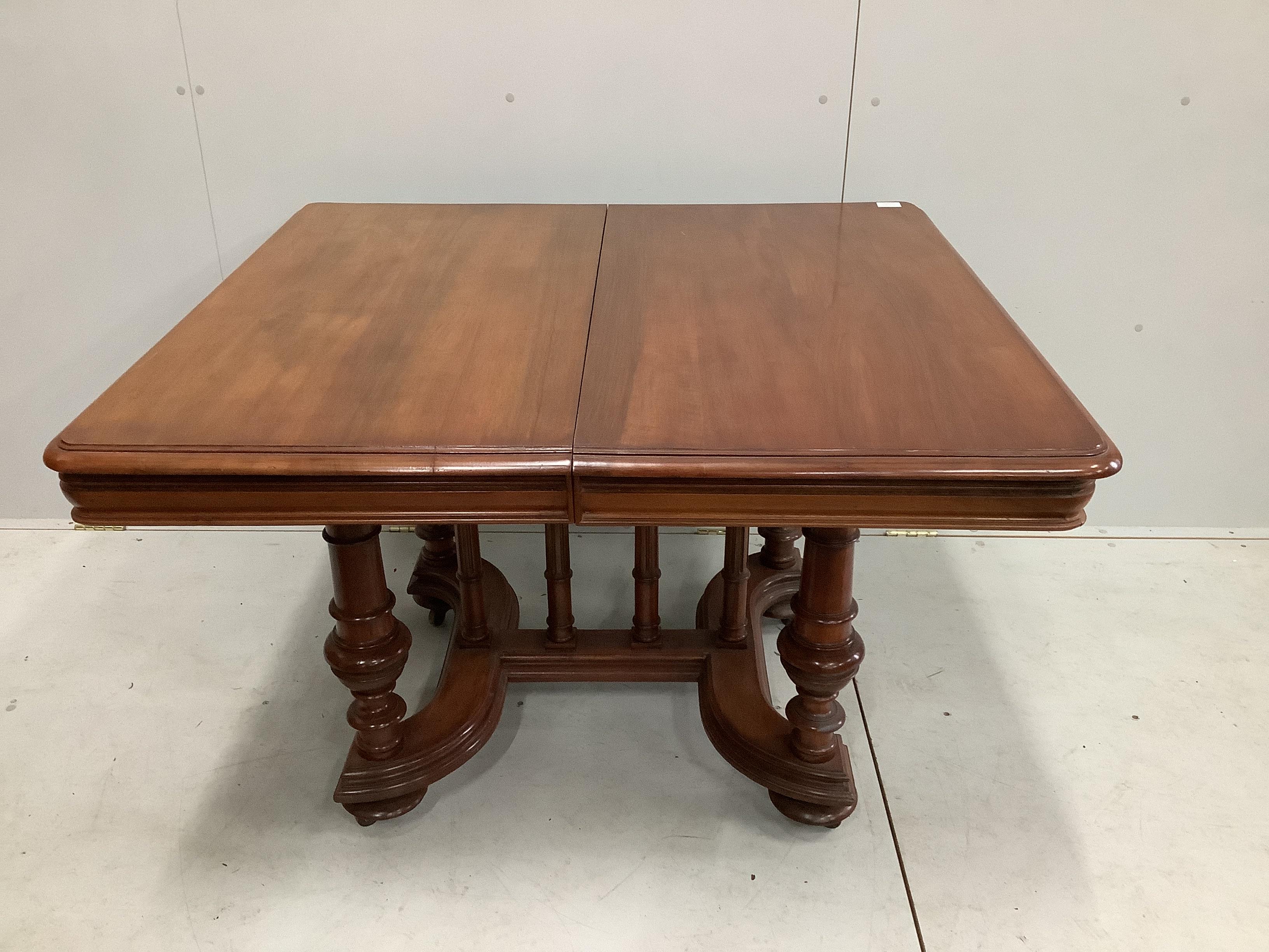 A 19th century and later French mahogany extending dining table, 232cm extended, two spare leaves, depth 104cm, height 74cm